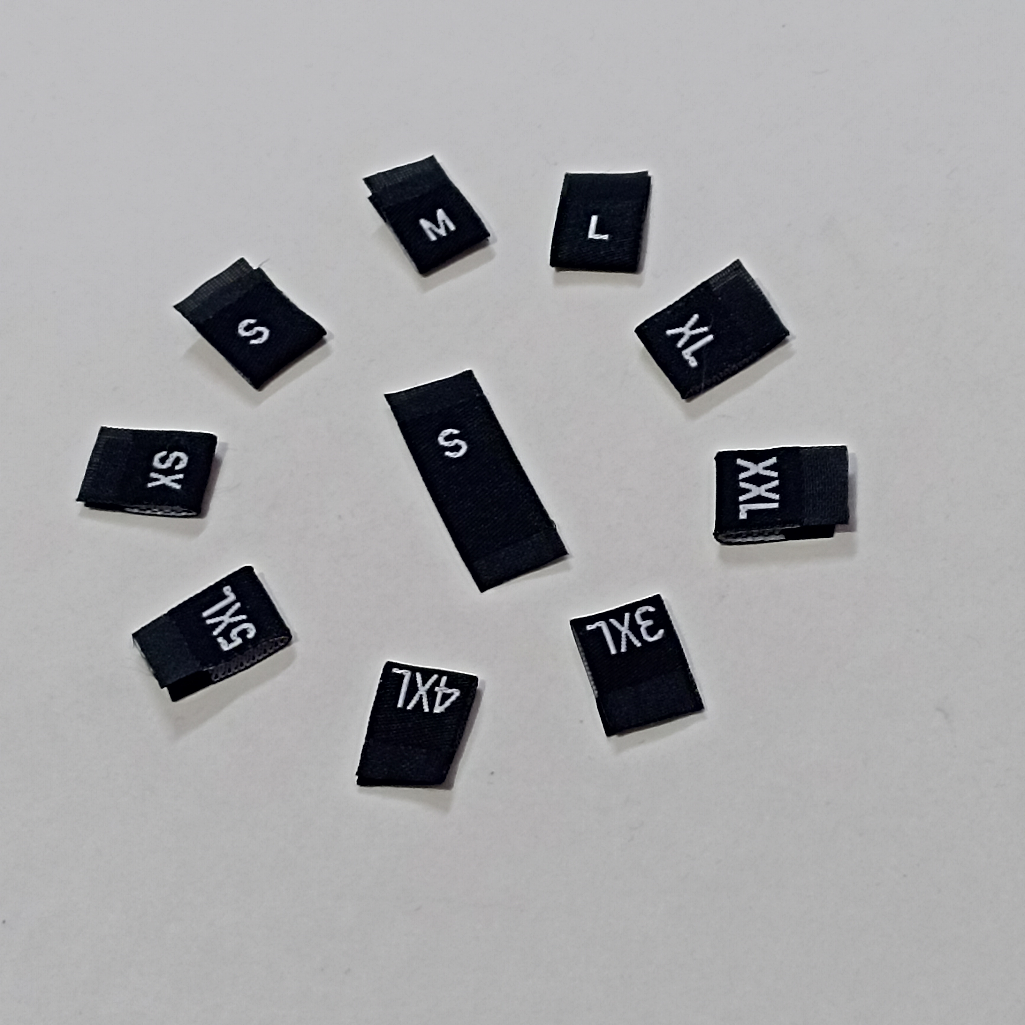 Manufacturer, Exporter, Importer, Supplier, Wholesaler, Retailer, Trader of Woven Size Label in New Delhi, Delhi, India